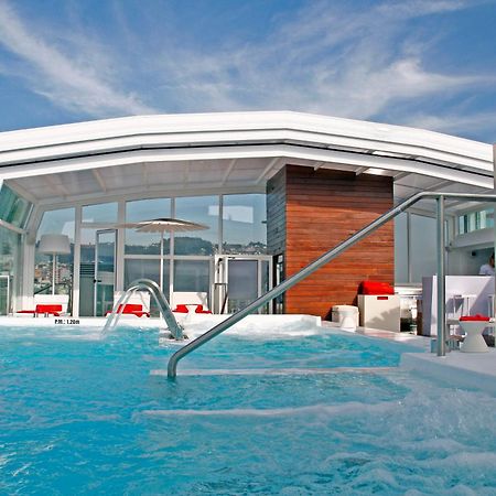 فندق آند سبا جران ناجاري بوتيك فيجو المظهر الخارجي الصورة The rooftop pool at the Mandarin Oriental Barcelona